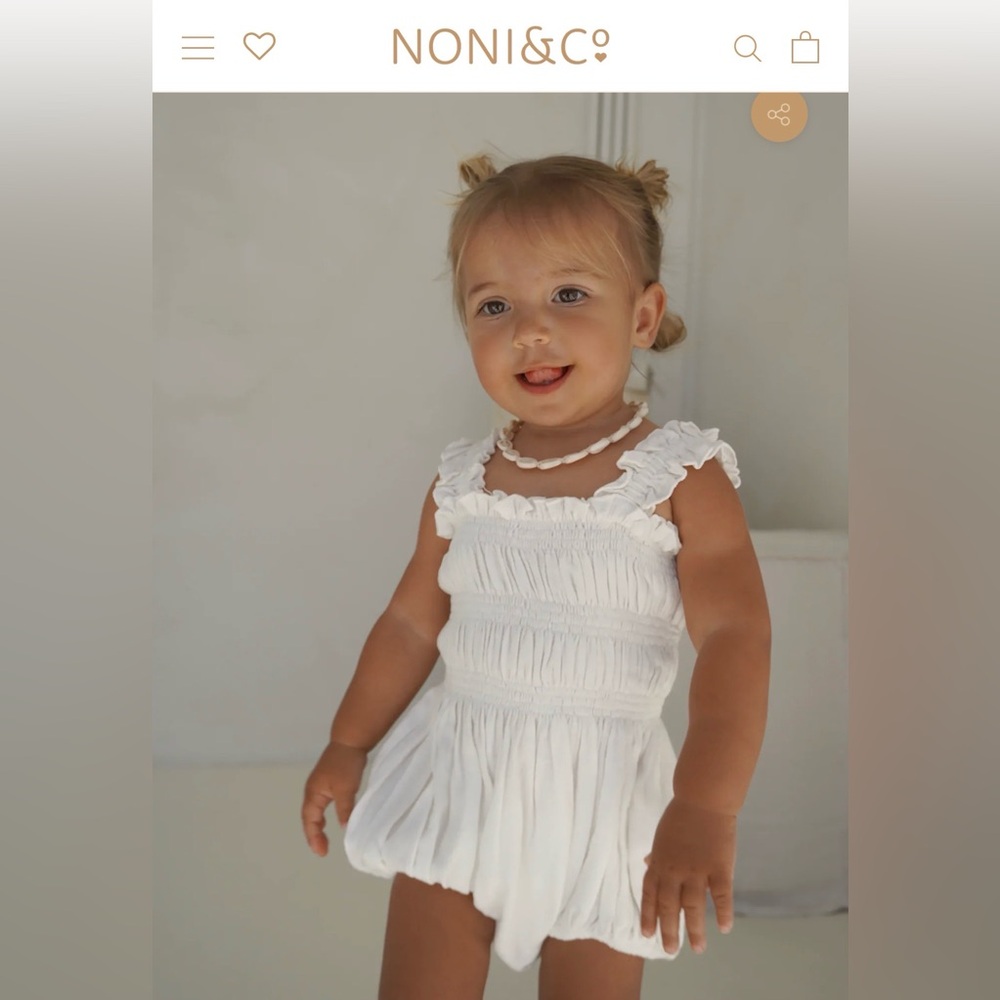 White Smocked Ruffle Baby One-Piece